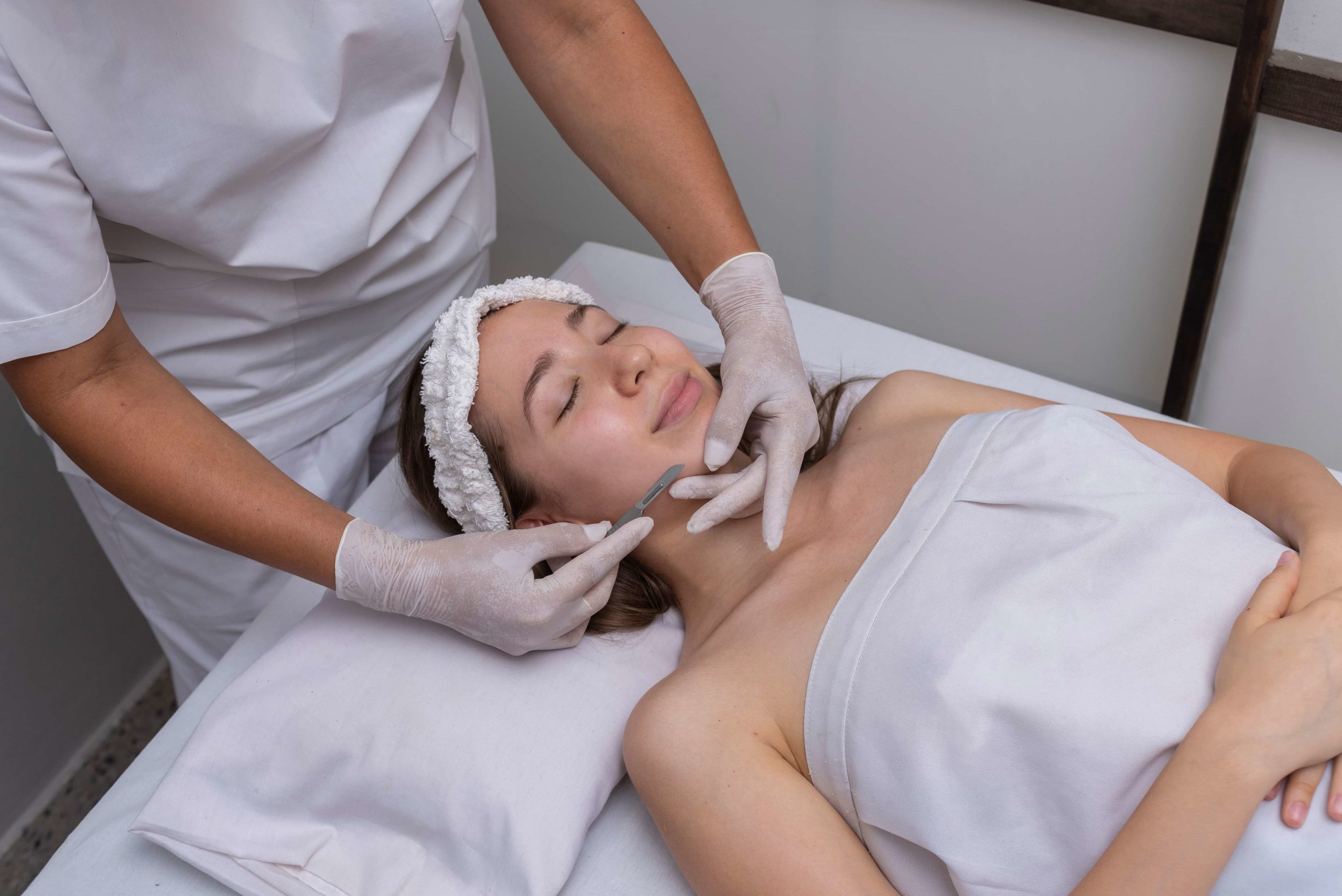 A Pretty lady is getting Dermaplanning Facial treatment | The BB Organics in West Hartford, CT.